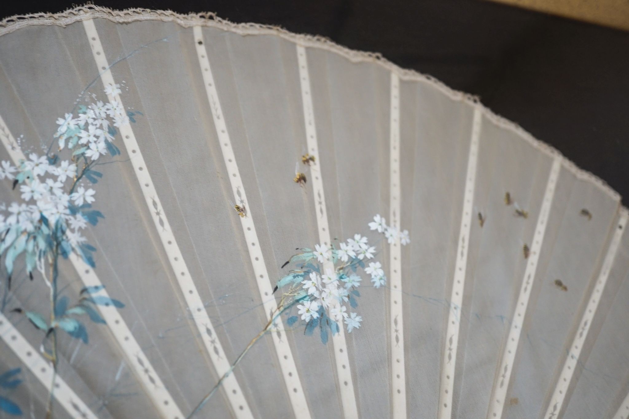 A framed 19th century French mother of pearl and painted silk fan, approx. 60cm long excl frame